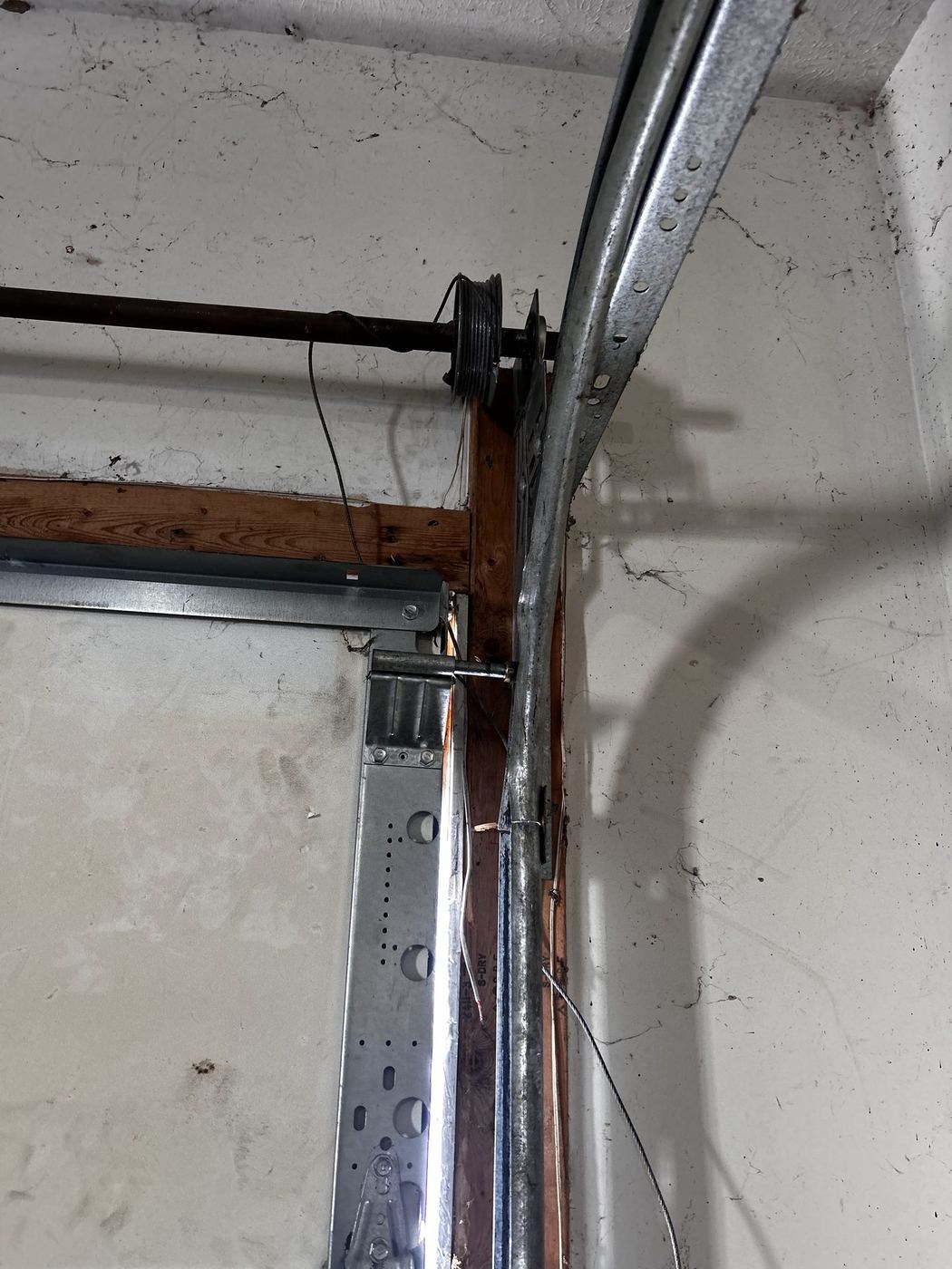 Track and torsion shaft