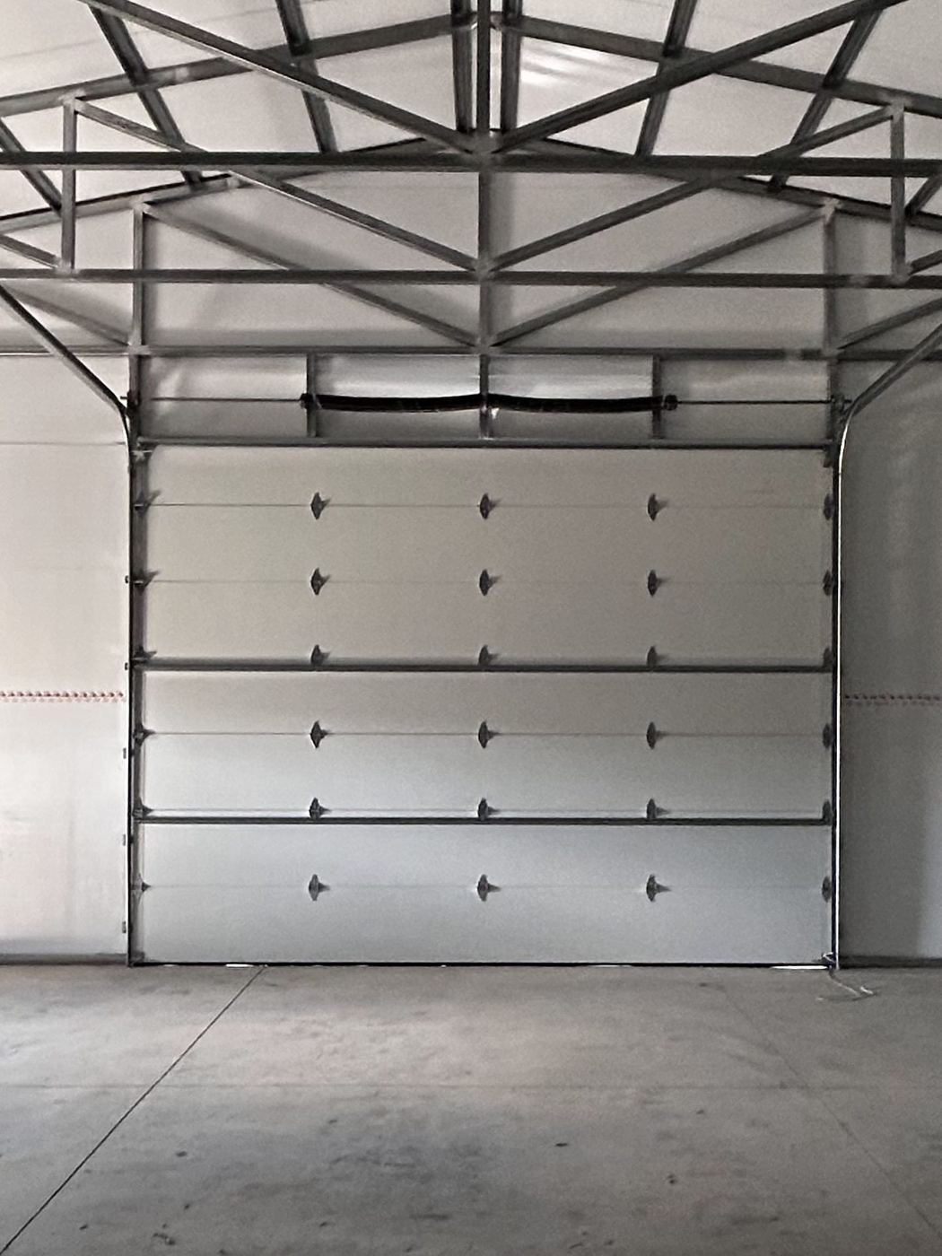 New sectional door in a steel building
